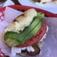 Vegetariana · Slices of fresh avocado, Venezuelan guayanes cheese, sweet plantains and a slice of tomato. 