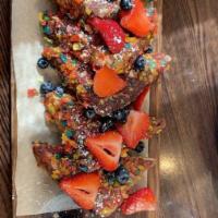 Fruity Pebbles French Toast · This brunch dish was featured on Society 19 amazing new places in queens to try. French toas...