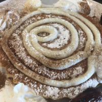 Cinnamon Bun French Toast · Two of our own freshly baked cinnamon buns dipped in our batter and baked to perfection.
