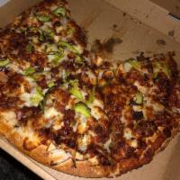 BBQ Chicken Pizza · Chicken, red onion, bacon, green peppers with BBQ sauce and mozzarella cheese.