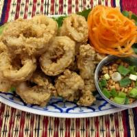 Crispy Squid · Deliciously fried calamari, served with homemade plum sauce and roasted peanut