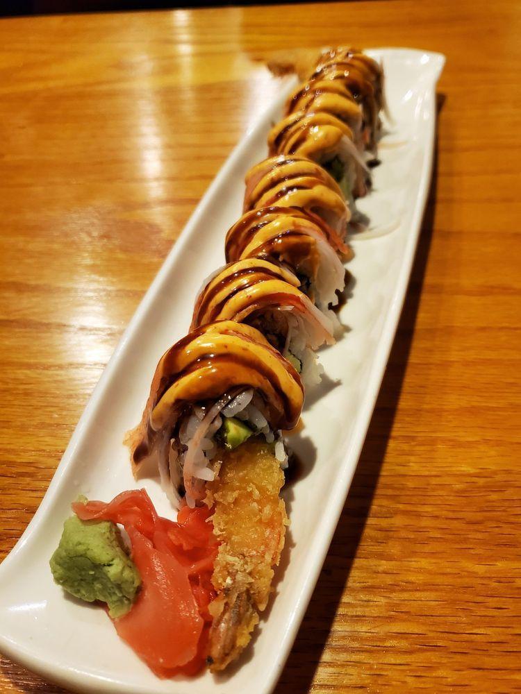 Shaggy Dog Roll · Shrimp tempura, avocado inside. Topped with crab stick, spicy mayo and eel sauce.
