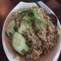 Crab Fried Rice · Dungeness crab, scallions, onion and egg.