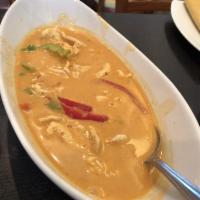Panang Curry · A special panang curry paste with coconut milk, bell peppers, green peas, kaffir lime leaves...