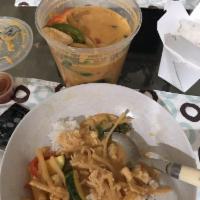 Red Curry · Hot and spicy red curry with bamboo shoots, zucchinis, bell peppers, basil leaves, and your ...