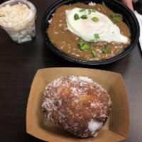 Loco Moco · Homemade ground beef teriyaki patty, served with brown gravy, over easy egg over rice & gree...