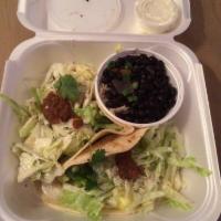Mahi Tacos · Cajun grilled mahi, lettuce, shredded cheddar Jack cheese, cilantro white sauce, house salsa...