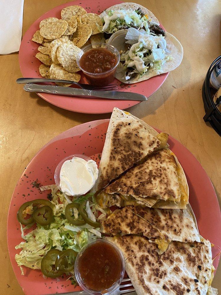 BBQ Chicken Quesadilla · Fresh grilled chicken tossed in smoky BBQ sauce, applewood bacon, shredded cheddar Jack cheese, pico de gallo, grilled in a flour tortilla and served with sour cream, salsa, lettuce and pickled jalapenos. 