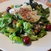 Sonoma Salad · Red leaf lettuce, spinach, grapes, raisins, apples, goat cheese, glazed pecans, and housemad...