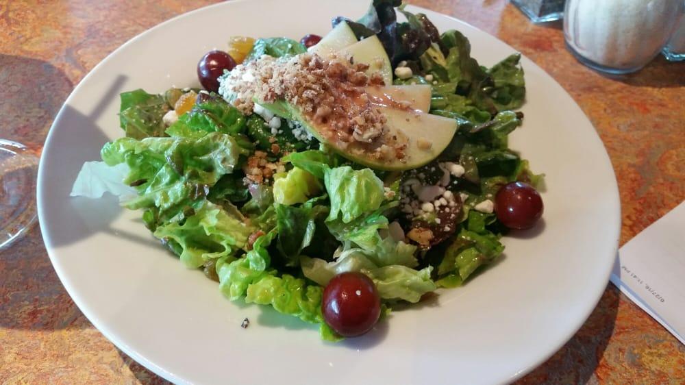 Sonoma Salad · Red leaf lettuce, spinach, grapes, raisins, apples, goat cheese, glazed pecans, and housemade blood orange vinaigrette.