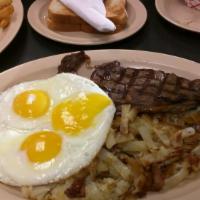 Steak and Eggs · Steak served with 3 eggs, hash browns and toast.