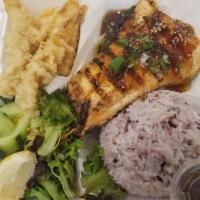 Salmon Bento · Salmon filet is grilled, then topped with teriyaki sauce. Served with a scoop of rice, side ...