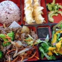 Beef Bento · Marinated beef stir fried with broccoli, carrots, and onions. Served with a scoop of rice, s...