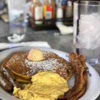 Pancake Platter · Dusted with powdered sugar & topped with our own homemade whipped butter served with two str...