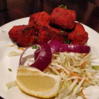 Chicken Tikka · Boneless, cubed chicken breast meat, marinated in special house made sauce and grilled in ta...