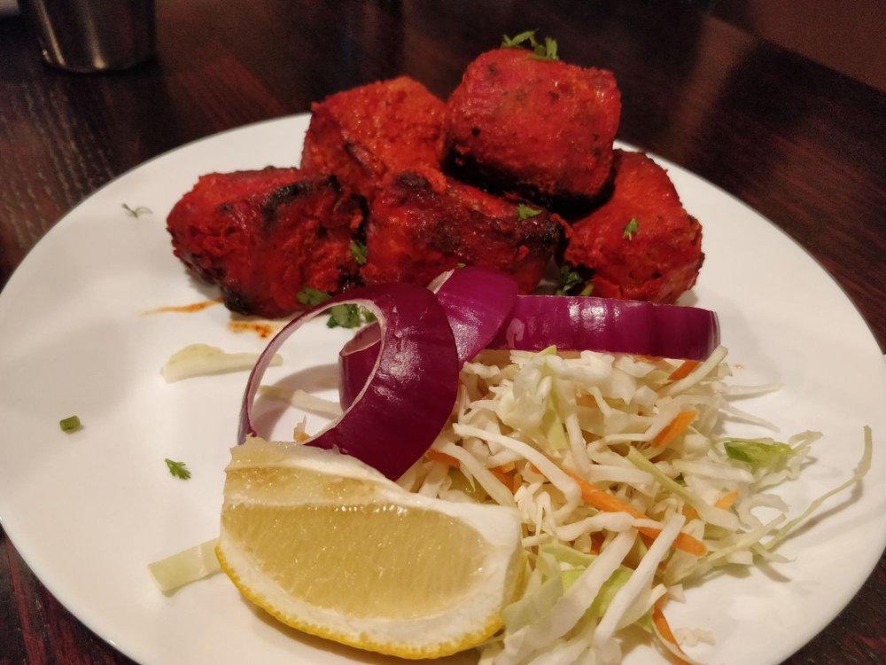 Chicken Tikka · Boneless, cubed chicken breast meat, marinated in special house made sauce and grilled in tandoor oven.