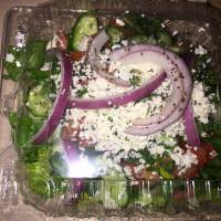Greek Salad · Romaine lettuce, fresh tomatoes, fresh mint, chopped parsley, onions, cucumber and feta chee...