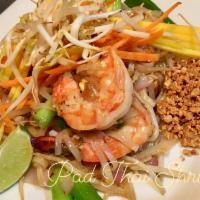 Pad Thai · Stir-fried rice noodles red onion with tofu, bean sprouts, scallions, egg, ground peanuts an...