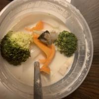 Tom Kha Soup · Light herbal broth with coconut milk, broccoli, carrots,lemongrass, galangal, mushrooms and ...
