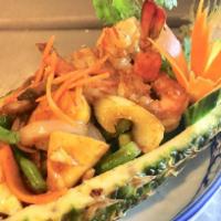 Pineapple Himmaparn · Stir-fried Thai chili paste in soybean oil, diced pineapples, cashew nuts, mushrooms, scalli...