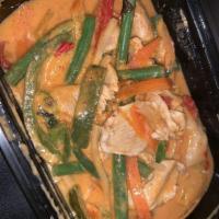 Red Curry · Blend of dried red chili peppers and coconut milk with fresh sweet basil leaves, bamboo shoo...