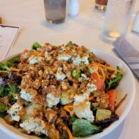 Jimmy'z Salad · Tomatoes, cucumbers, carrots, green onion, crumbled blue cheese, candied walnuts, and sherry...