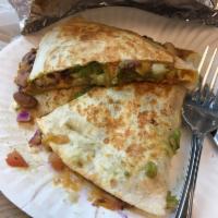 Quesadilla · Grilled Flour Tortilla, Cheese, Pico de Gallo, and Choice of Meat. Choice of 1x Fresh Salsa ...