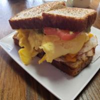 Mega Marley Sandwich · 2 Eggs, Bacon, Ham, Cheddar, Avocado and Tomato.