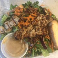 Bangkok Salad · Organic mixed greens served with ginger curry marinated grilled chicken, red onions, mint, s...