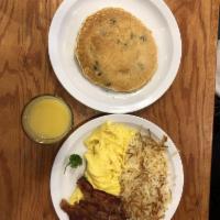 Breakfast Combo · 2 eggs, meat and a breakfast side and your choice of 2 pancakes or 2 French toast slices or ...