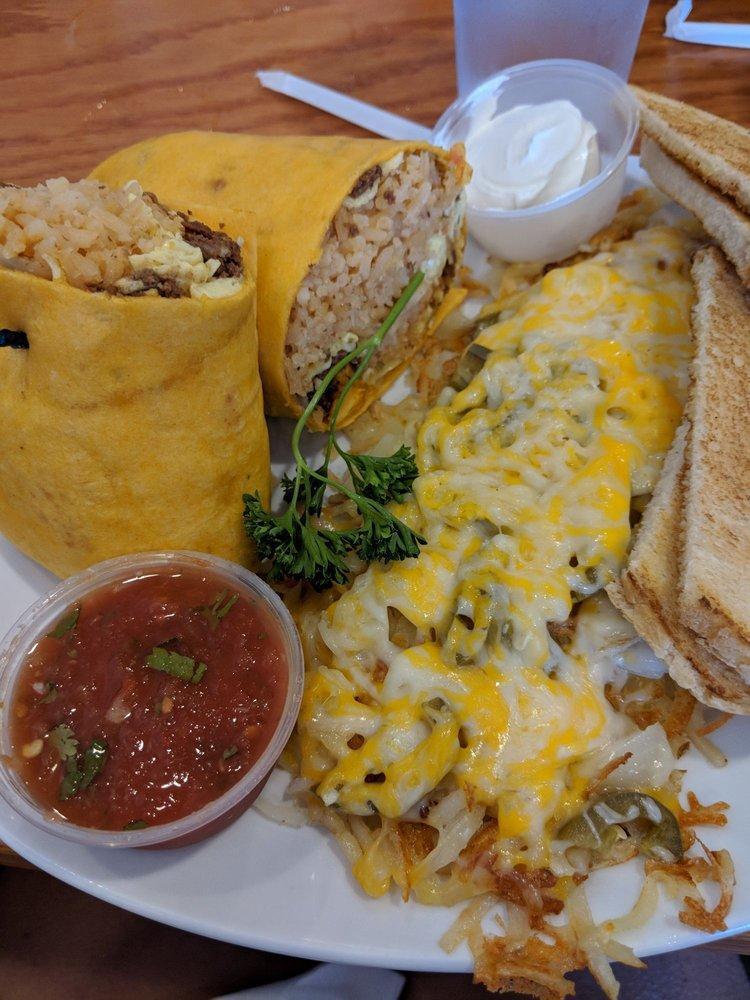 Chorizo Burrito · Grilled chorizo with onions, eggs, rice, feta cheese and your choice of tortilla.
