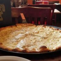 White Pizza · Mozzarella, ricotta, feta cheese and fresh garlic.