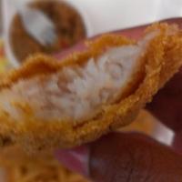 Catfish Fillets · Fresh seasoned catfish fillet battered with cornmeal fried until golden crispy. Served with ...