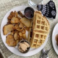 Chicken & Waffles · Fluffy Belgian waffle, fried chicken breast scaloppine, cinnamon butter, potato home fries a...