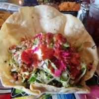 Super Taco Salad · Choice of meat or vegetarian, served in a large flour tortilla shell or barefoot in a bowl. ...