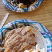 Apple Pie Crepe · Caramel, cooked cinnamon apple and whip cream.
