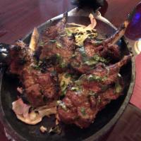 Lamb Chops · Succulent lamb chops marinated overnight with our signature spices and cooked in Tandoori cl...