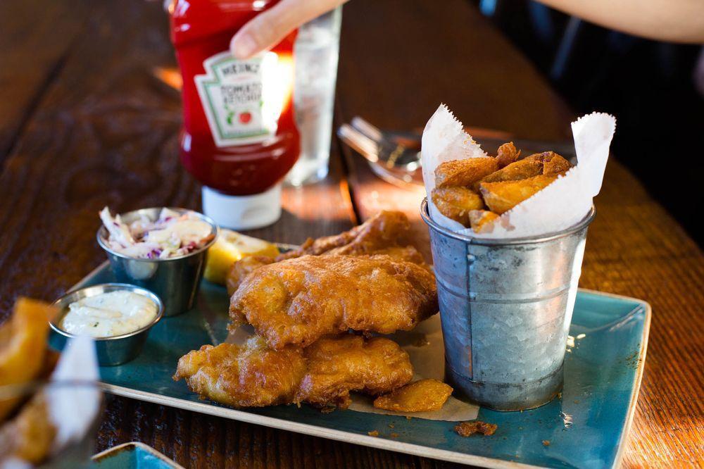 Fish and Chips · Beer battered and fried, served with rustic fries, homemade coleslaw and tartar sauce.