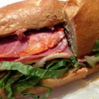 The Don Sandwich · Salami, mortadella, capocollo, ham and prosciutto, french roll, provolone, lettuce, tomato, ...