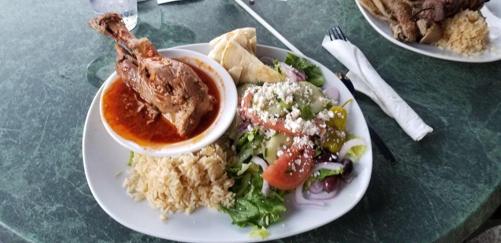 Lamb Shank Plate · Another special dish from the middle east. Slow baked lamb shank, served with pilaf rice, pita, and tzatziki sauce. Our best selling platter.