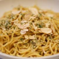 Garlic Noodles · Our most popular side! Yakisoba noodles tossed in our housemade Garlic Butter sauce and topp...