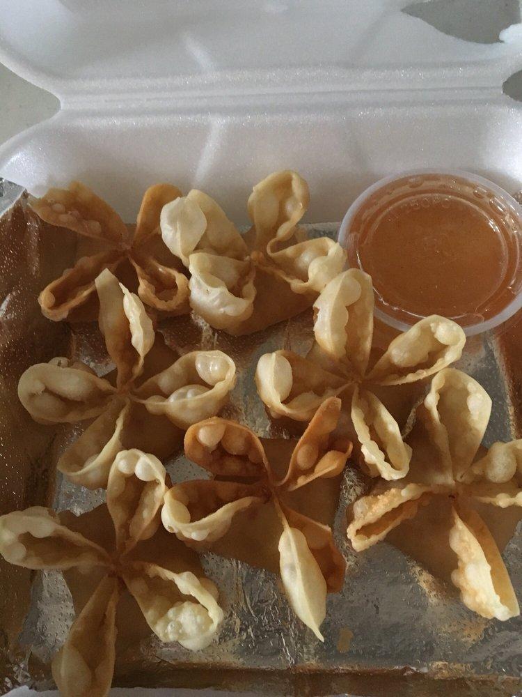 Crab Rangoon · Cream cheese and imitation crab meat folded in wonton paper and deep fried, served with sweet and sour sauce. 