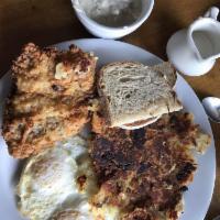 Chicken Fried Steak · Buttermilk dipped deep fried cube steak, sausage gravy, two cage free eggs any style, season...