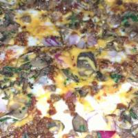 Bacon Cheeseburger Pizza · Pizza sauce, house cheese blend, seasoned ground beef, red onions, mushrooms, cayenne-candie...
