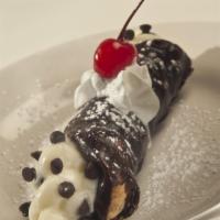 Cannoli · A light crispy pastry shell, served plain or dipped in chocolate, filled with a classic Ital...