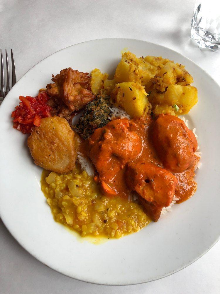 Aloo Gobi Ghar Ki · Potatoes and cauliflower cooked with roasted spices. Vegan.