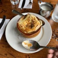 French Onion Soup · Topped with bread gratinee au Gruyeres
