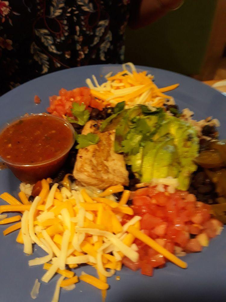 Island Bowl · A large serving of black beans and brown rice topped with shredded cheddar Jack cheese, sour cream, tomatoes, pickled jalapenos, fresh green onions, and cilantro, served with house salsa. Gluten-free. Vegetarian. 