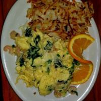 Seafood Scramble Breakfast · Crab, shrimp, mushroom, green onion and Jack cheese. Served with home fries and choice of to...