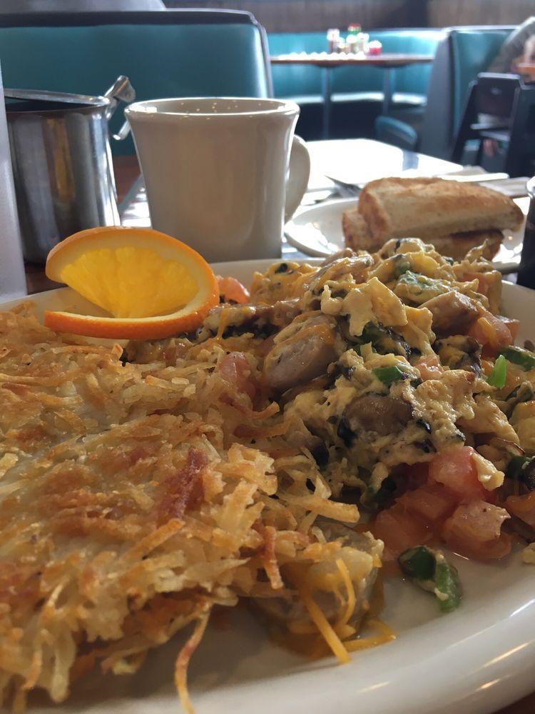 Queen Anne Omelet Breakfast · Sausage, mushroom, onion, green pepper, tomato and cheddar cheese. Served with home fries and choice of toast.